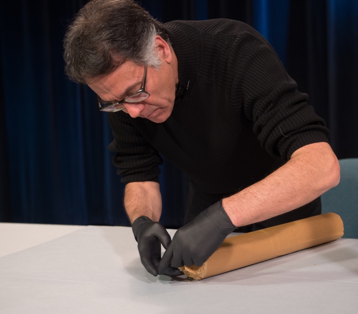 Patrick Ravines works on opening early 19th Century platinotype paper cannister